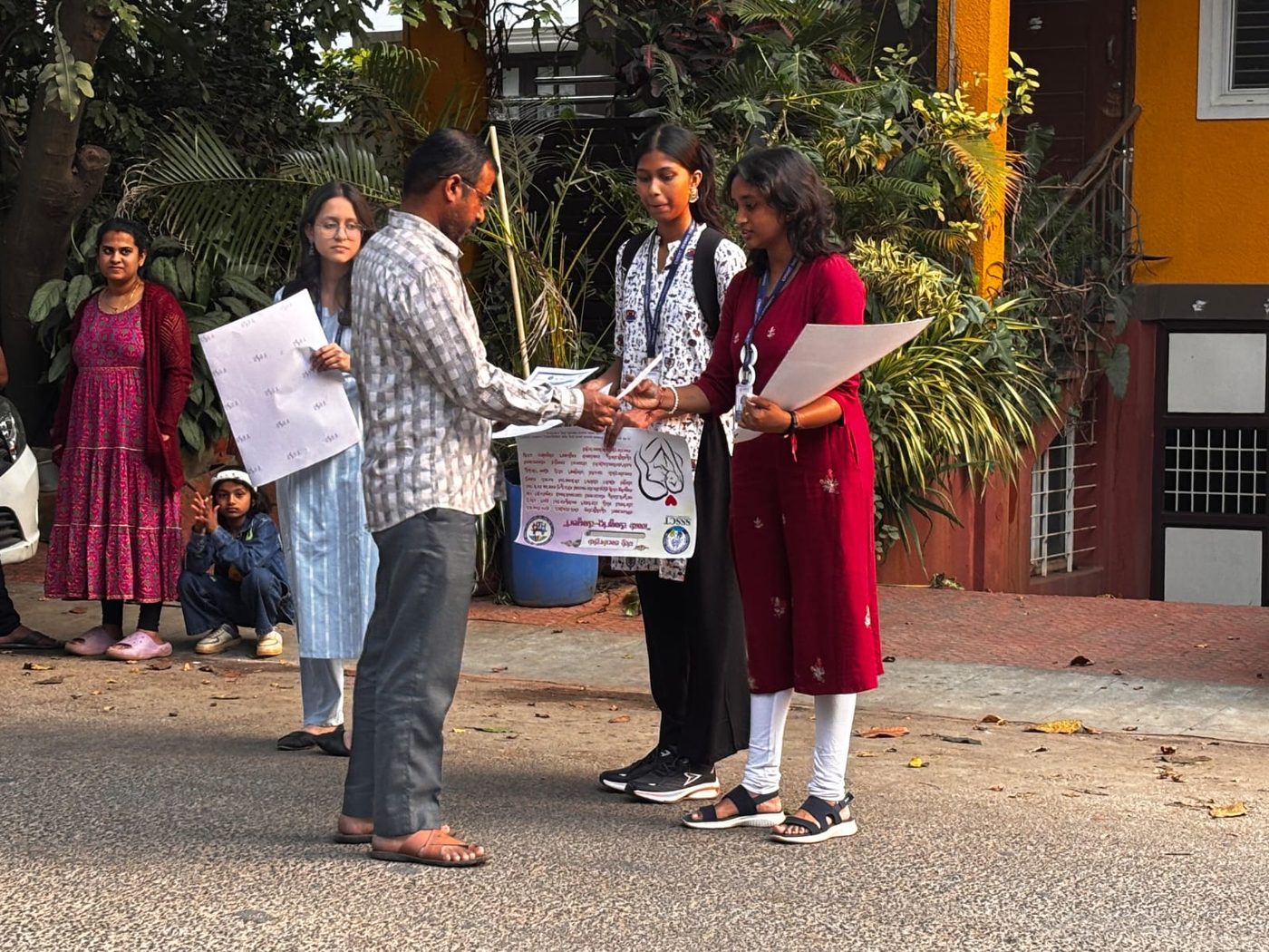 Students presenting adoption awareness posters