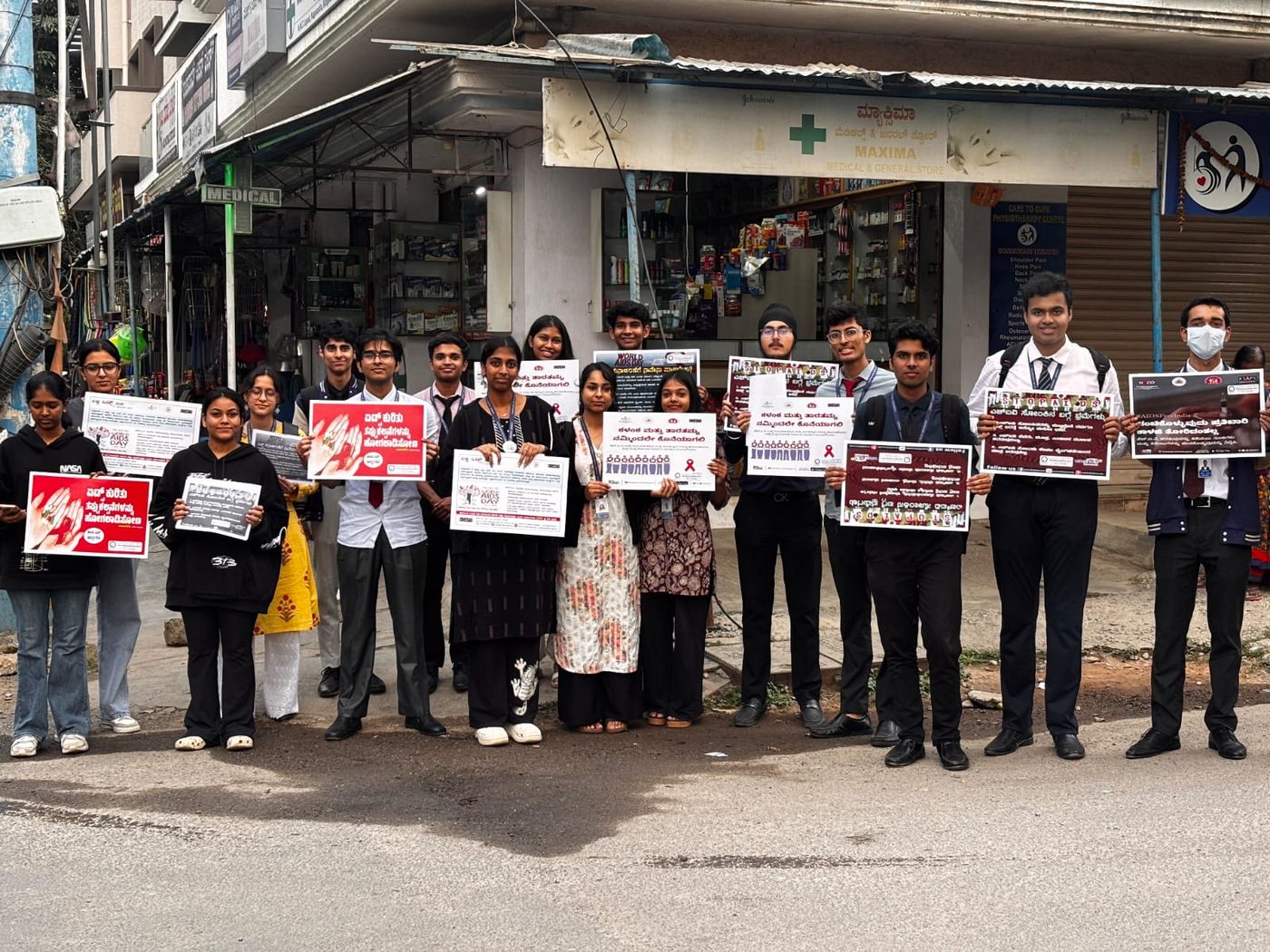 Volunteers holding awareness posters