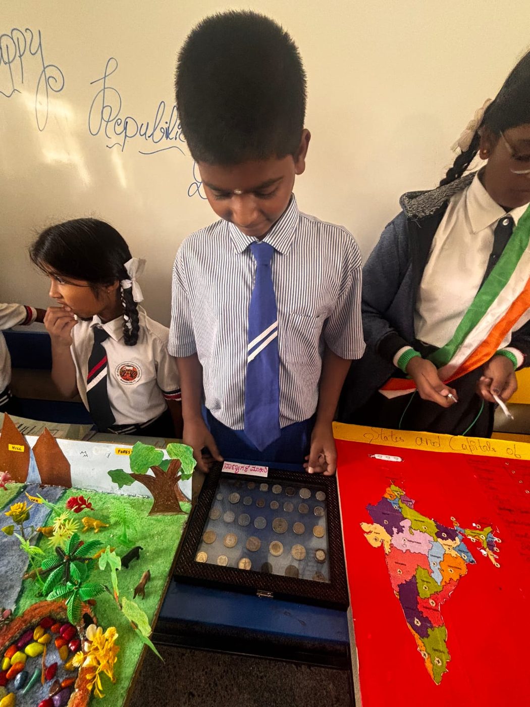 Children presenting science exhibition models