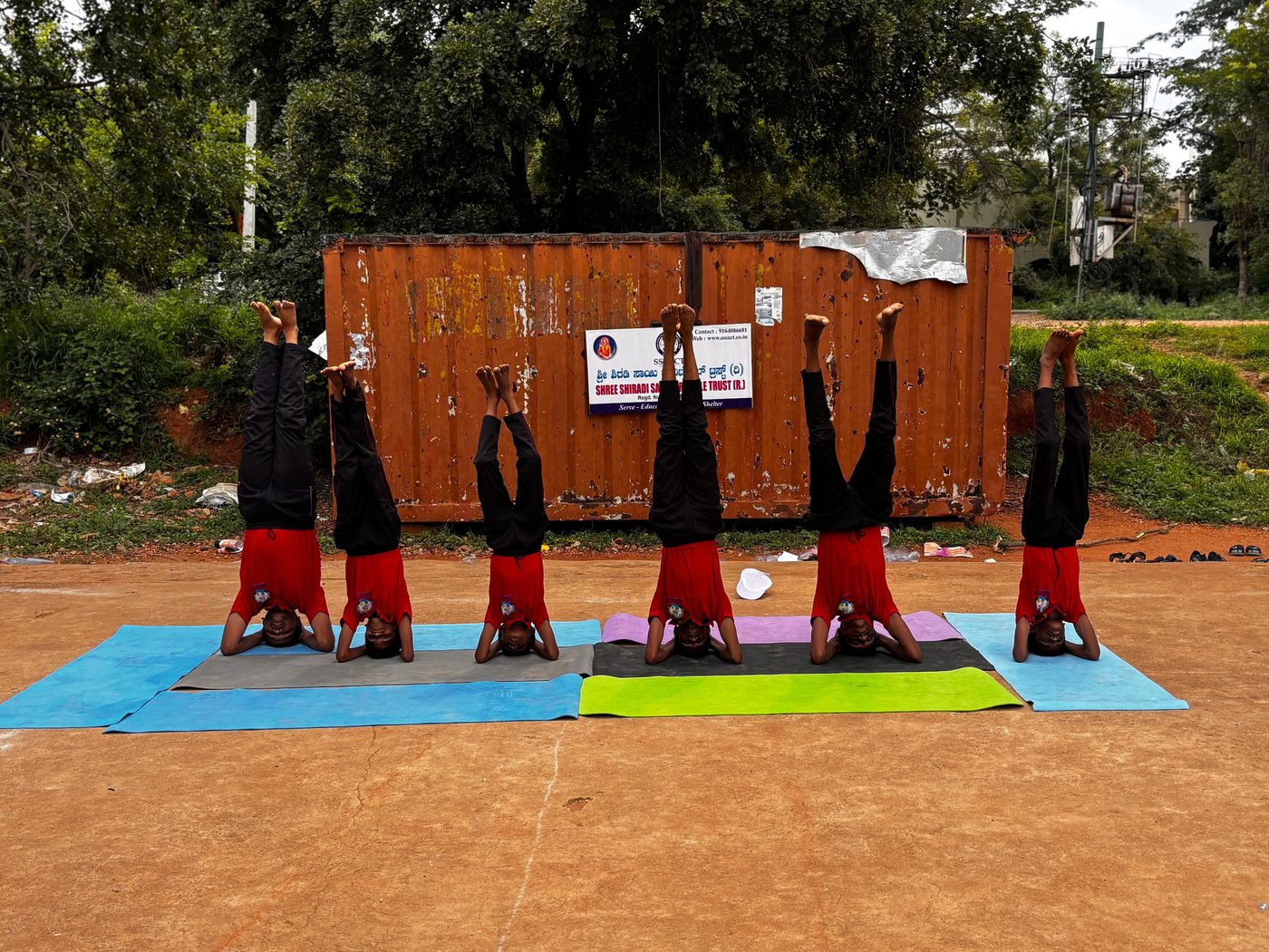 Children practising yoga together