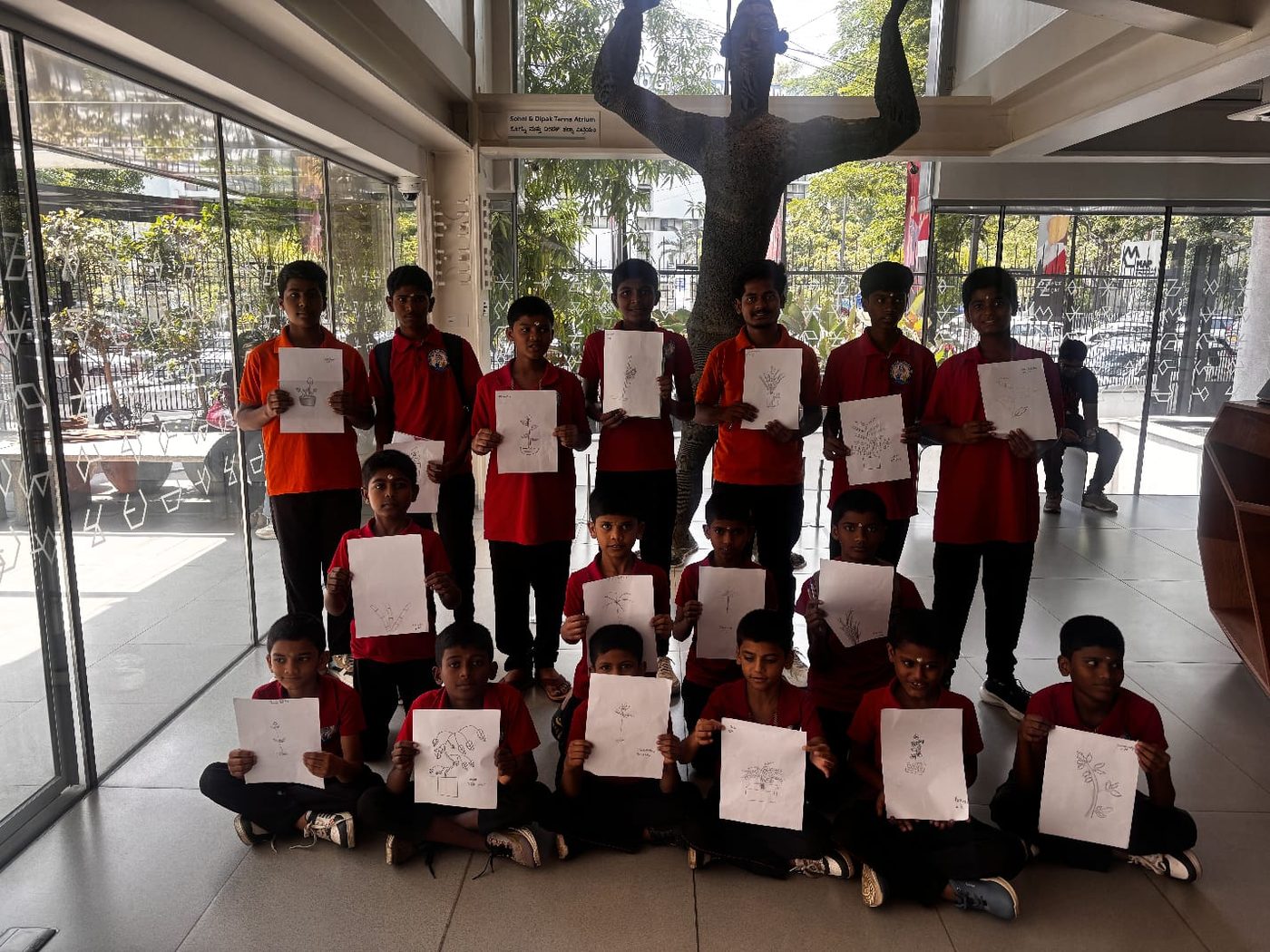 Children with drawings at the art museum